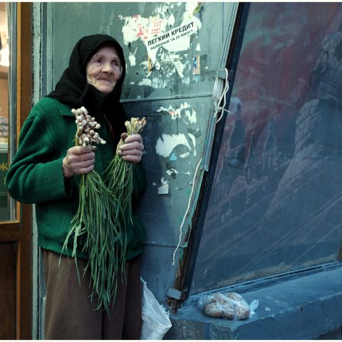 The old lady who sells green onions and garlic.