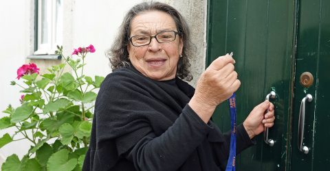 Old woman in Alfama