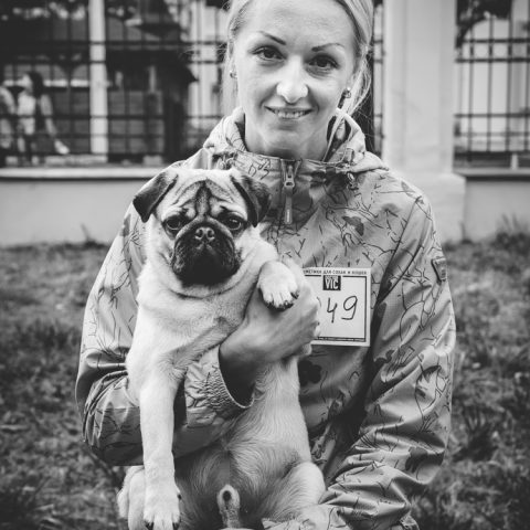 A woman with her dog an a dog show