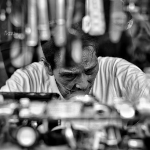 Looking through the booth of a watchmaker.