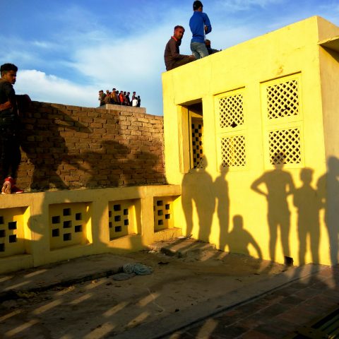 People watching holi celebration at Vrindavan