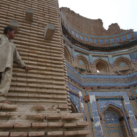 Boy on a ruined mausoleum