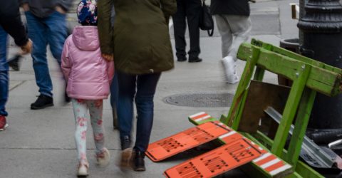 Pink girl with construction signs