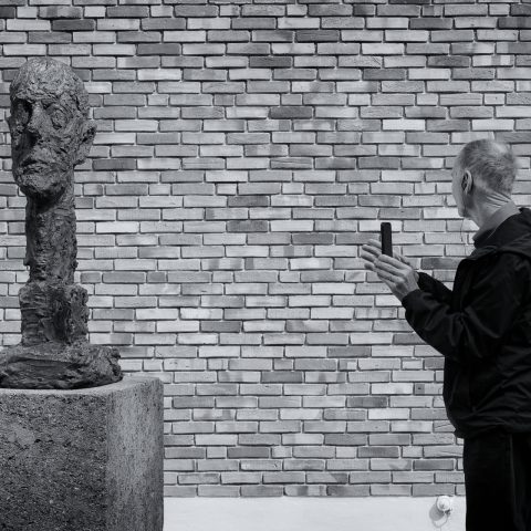 Man Before Wall