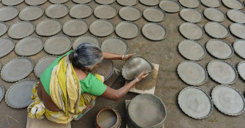 Wold woman and clay plate