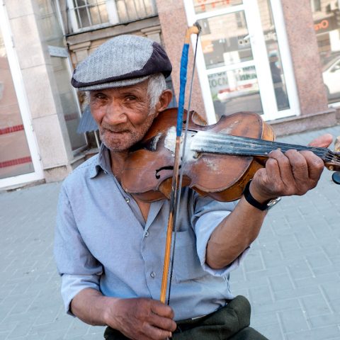 The photographer walked through the town …