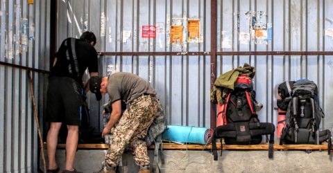 tourists collect backpacks