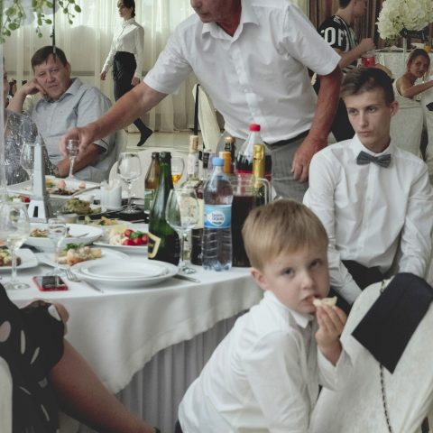 kid at a wedding