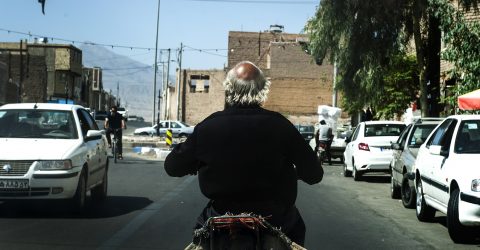 With the motorcyclist