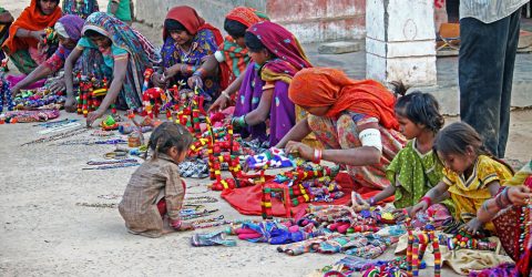 WOMEN SELLING HANDICRAFT TOYS