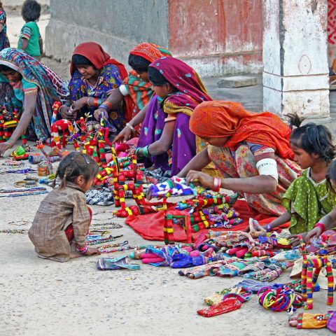 WOMEN SELLING HANDICRAFT TOYS