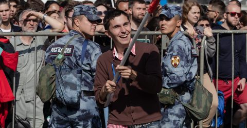 Joyful protesting journalist