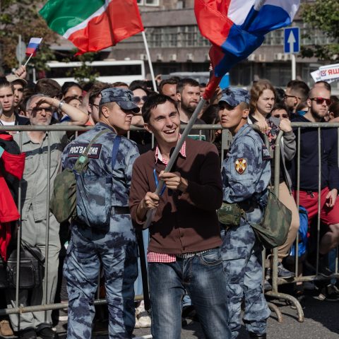 Joyful protesting journalist