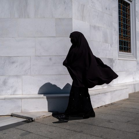 Woman near Ulus Itfaiye meydani Camisi