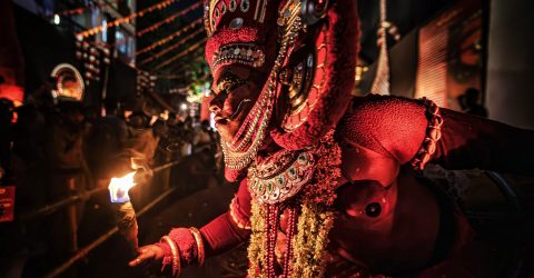 The Theyyam festival is a sacred and ancient ritual art form originating from Kerala, India, where a performer, known as a kolam, embodies a deity in a trance-like state through energetic dance and intricate makeup. This ritual is a vital part of local religious festivals, believed to bring prosperity and remove hazards for the community. Occurring between October and April, Theyyam performances are not mere spectacles but deeply rooted expressions of community faith and ancient history, a unique blend of theatre, mime, and worship.