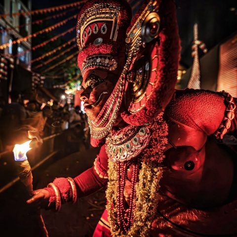 The Theyyam festival is a sacred and ancient ritual art form originating from Kerala, India, where a performer, known as a kolam, embodies a deity in a trance-like state through energetic dance and intricate makeup. This ritual is a vital part of local religious festivals, believed to bring prosperity and remove hazards for the community. Occurring between October and April, Theyyam performances are not mere spectacles but deeply rooted expressions of community faith and ancient history, a unique blend of theatre, mime, and worship.