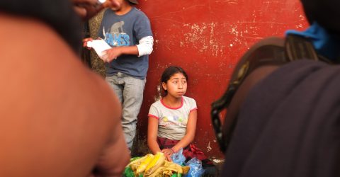Girl selling corn