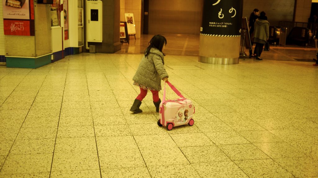 kid with suitcase Exibart Street
