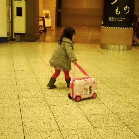 kid with suitcase