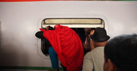 Passenger riding trains through the window for challenging journey-06