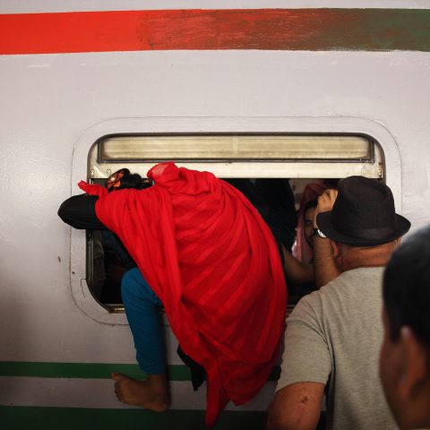 Passenger riding trains through the window for challenging journey-06