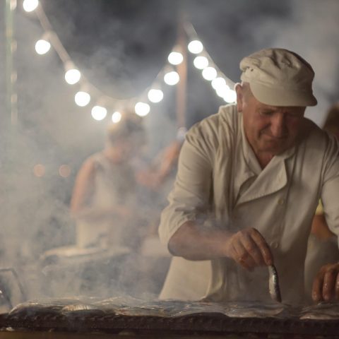 Man grilling fish