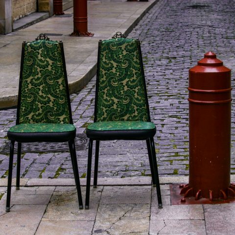 Two chairs and a pole