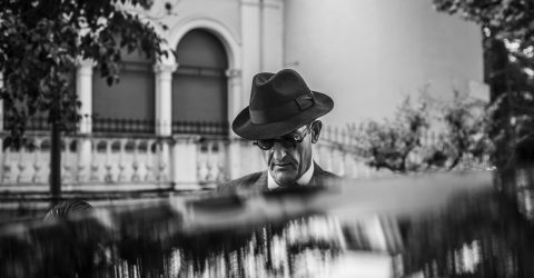 The man in the black hat
