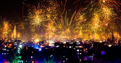 celebrating new year in street fire works
