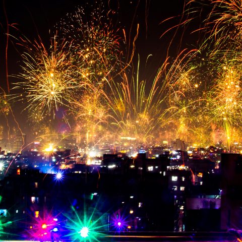 celebrating new year in street fire works