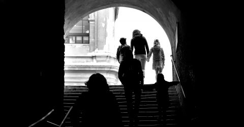 Family on the steps in the tunnel
