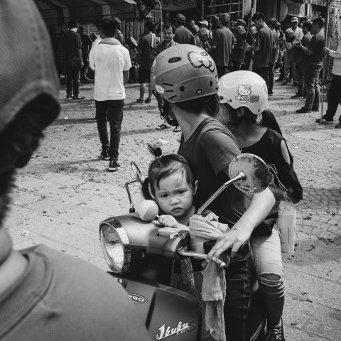 The little girl onthe scooter